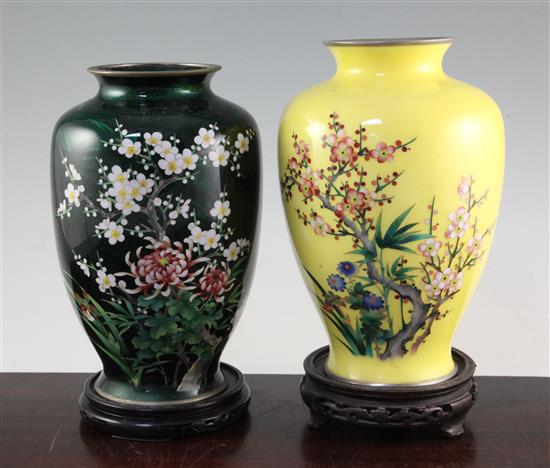 Two Japanese cloisonne enamel ovoid vases, mid 20th century, both 24.5cm, some damage, wood stands